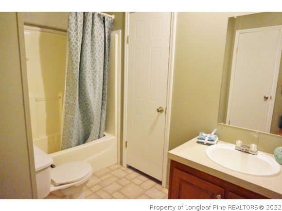 2972 Underwood Road Carthage, NC 28327 - Photo 19 of 24 a bathroom with a sink a mirror and a shower
