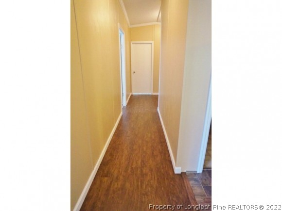 2972 Underwood Road Carthage, NC 28327 - Photo 10 of 24 a view of a hallway with wooden floor