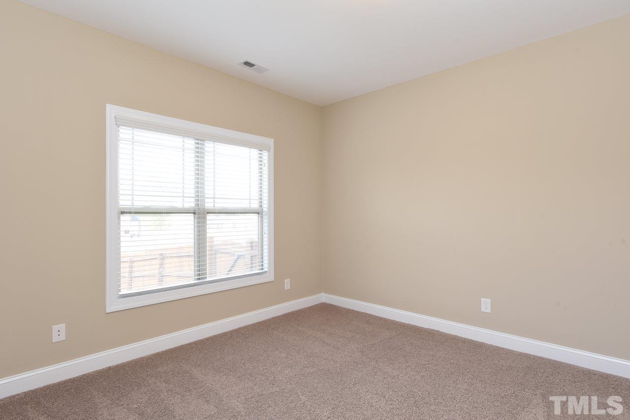 43 Sharpstone Lane Clayton, NC 27527 - Photo 19 of 39 an empty room with a window