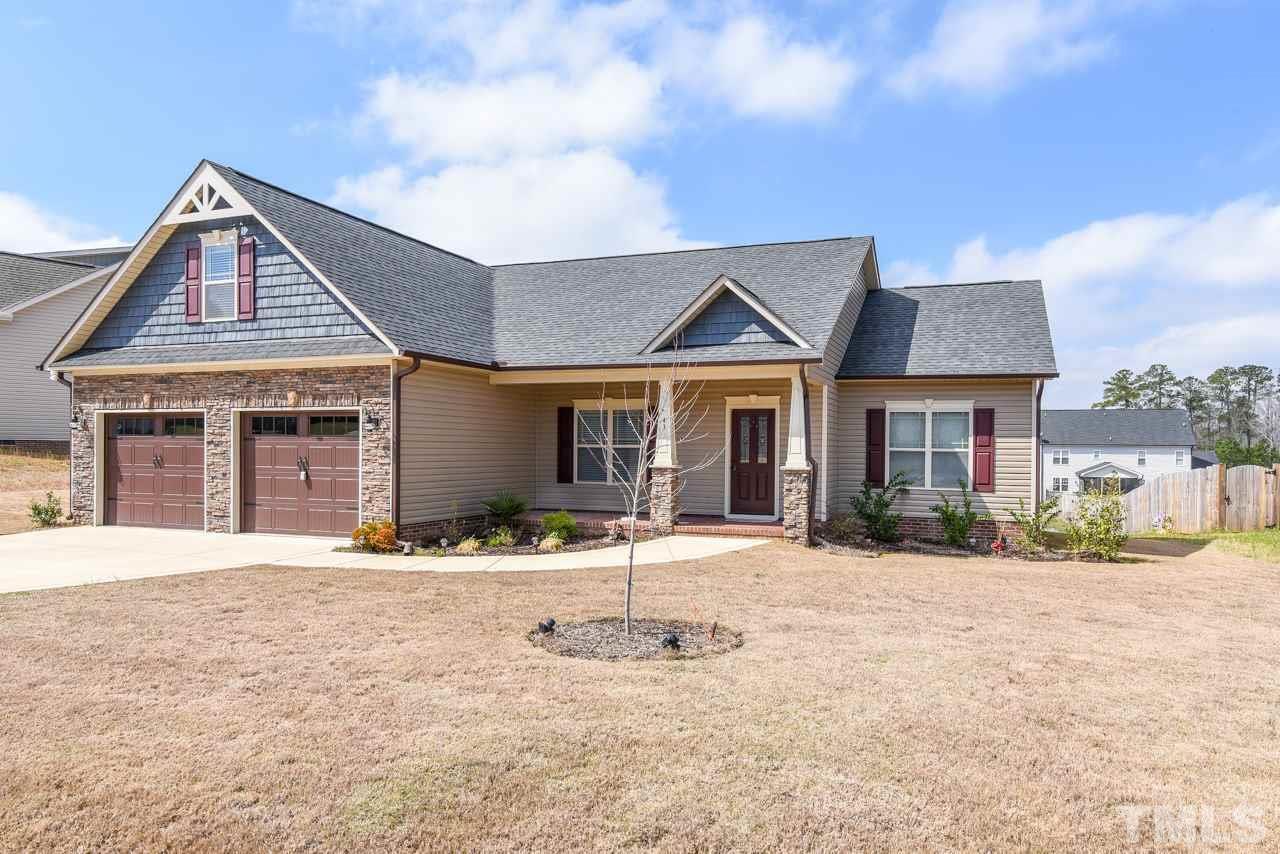 43 Sharpstone Lane Clayton, NC 27527 - Photo 2 of 39 a front view of a house with a yard
