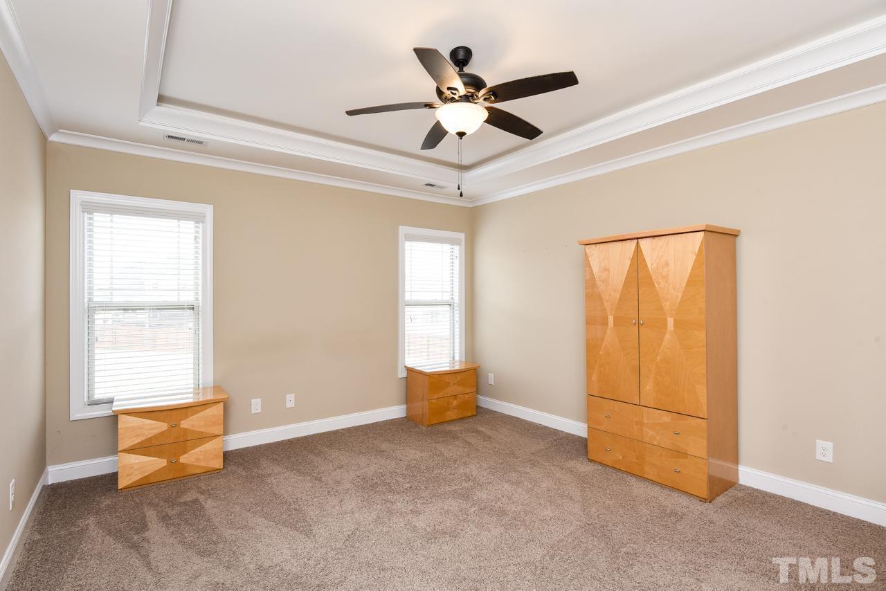 43 Sharpstone Lane Clayton, NC 27527 - Photo 23 of 39 a living room with furniture and a window