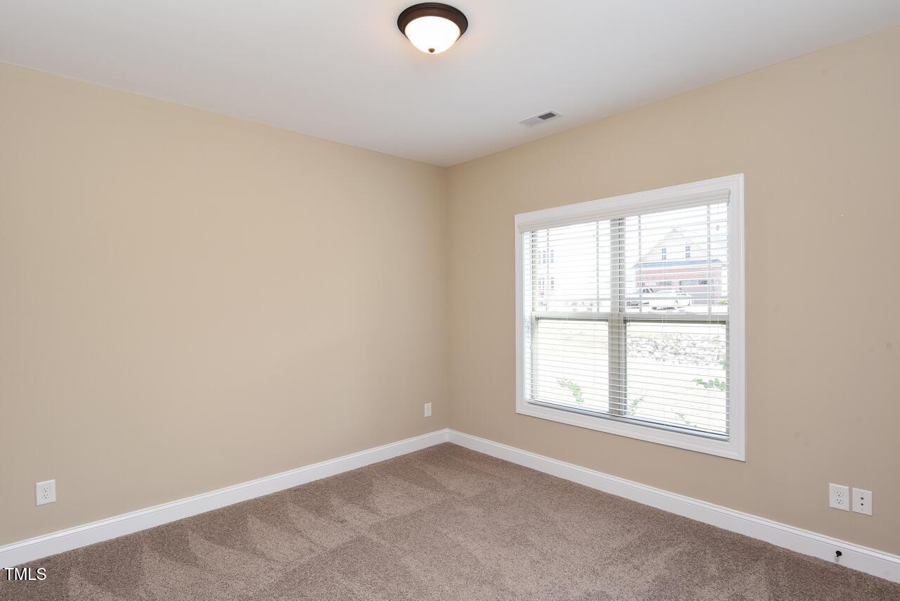 43 Sharpstone Lane Clayton, NC 27527 - Photo 28 of 39 an empty room with a window