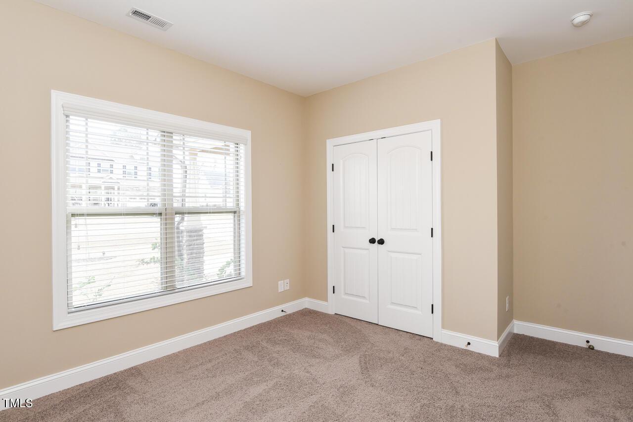 43 Sharpstone Lane Clayton, NC 27527 - Photo 29 of 39 an empty room with windows