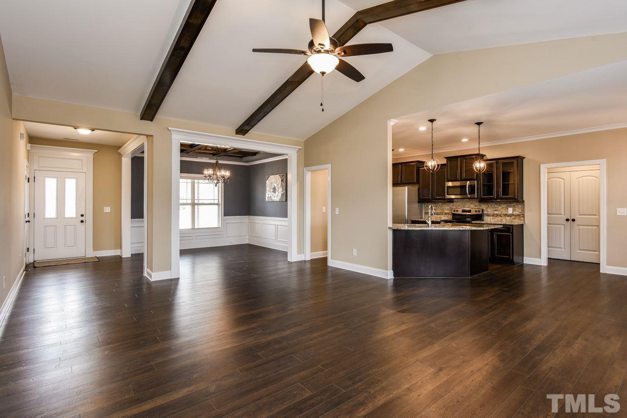 43 Sharpstone Lane Clayton, NC 27527 - Photo 9 of 39 a view of a kitchen with a sink and a stove top oven