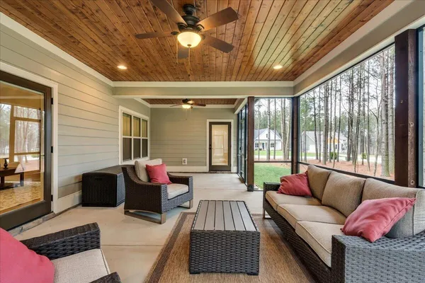 a view of a lake with a yard