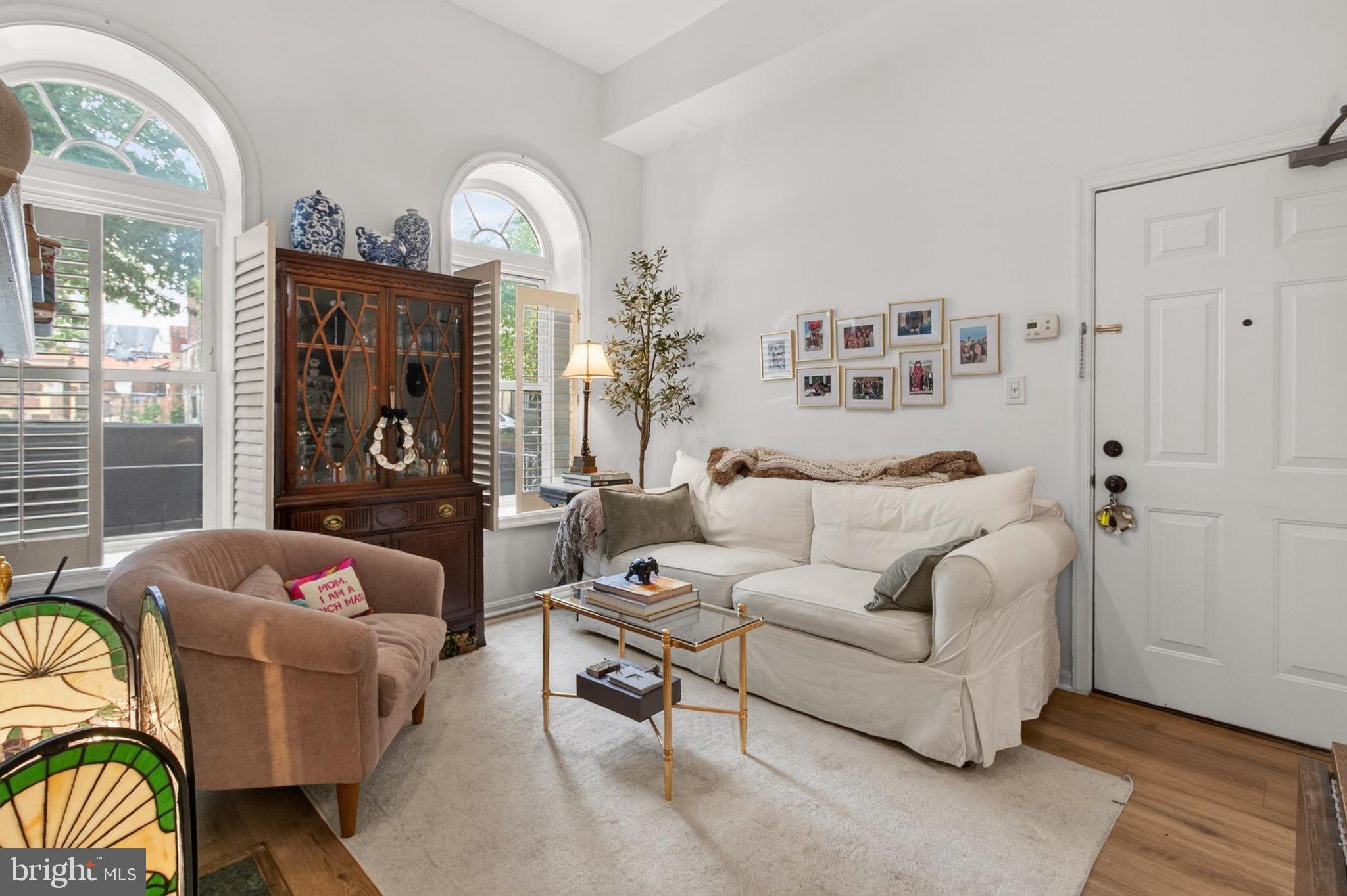 738 11th Street Northeast, Unit 1 Washington, DC 20002 - Photo 8 of 21 Charming living space with natural light.
