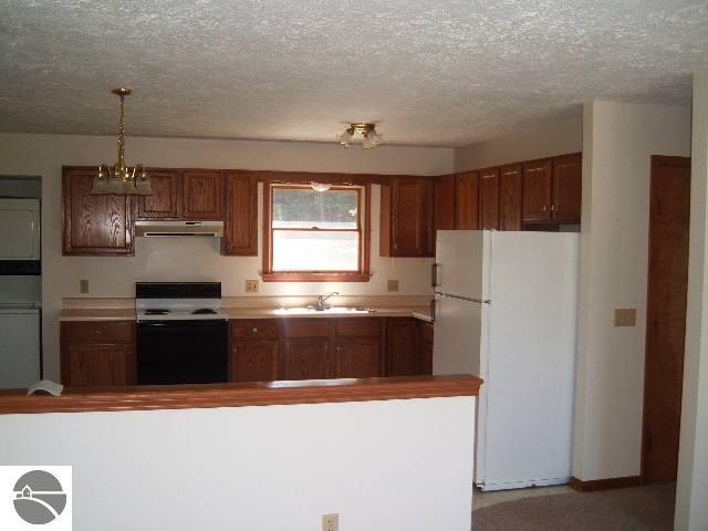 7117-9 Sullivan Road Grawn, MI 49637 - Photo 4 of 4 1660572-3.JPG