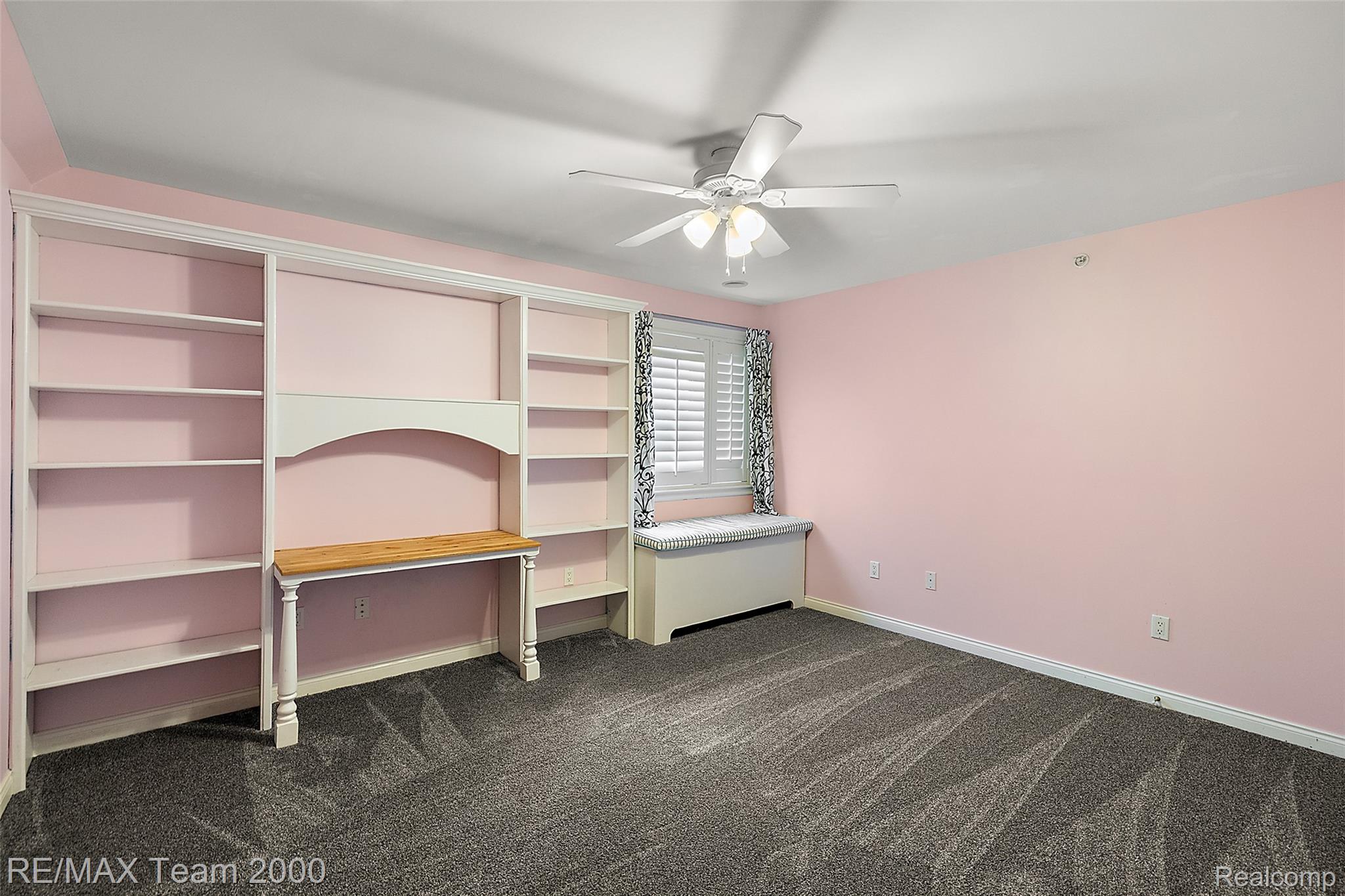 630 Sheldon Court Rochester, MI 48306 - Photo 62 of 94 Unfurnished bedroom featuring dark carpet and ceiling fan