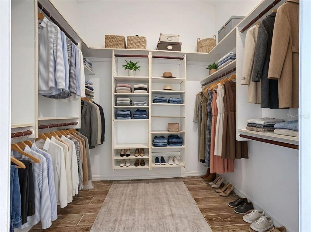 2414 Buckhorn Run Drive Valrico, FL 33596 - Photo 11 of 50 a view of walk in closet with clothes and shoes