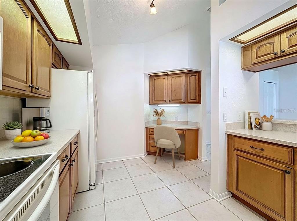2414 Buckhorn Run Drive Valrico, FL 33596 - Photo 18 of 50 a kitchen with stainless steel appliances granite countertop a sink stove and cabinets
