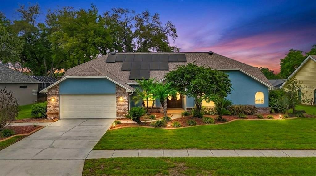 2414 Buckhorn Run Drive Valrico, FL 33596 - Photo 2 of 50 a front view of a house with a yard