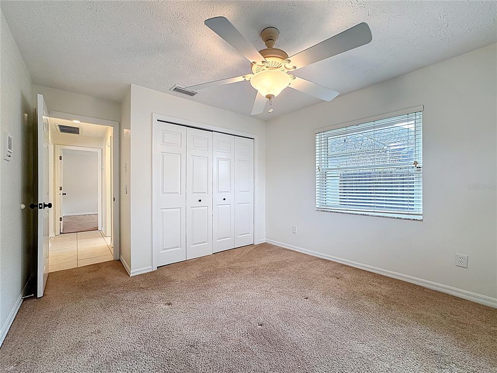 2414 Buckhorn Run Drive Valrico, FL 33596 - Photo 23 of 50 a view of an empty room with a window