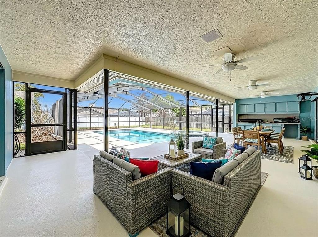 2414 Buckhorn Run Drive Valrico, FL 33596 - Photo 31 of 50 a living room with furniture and a large window