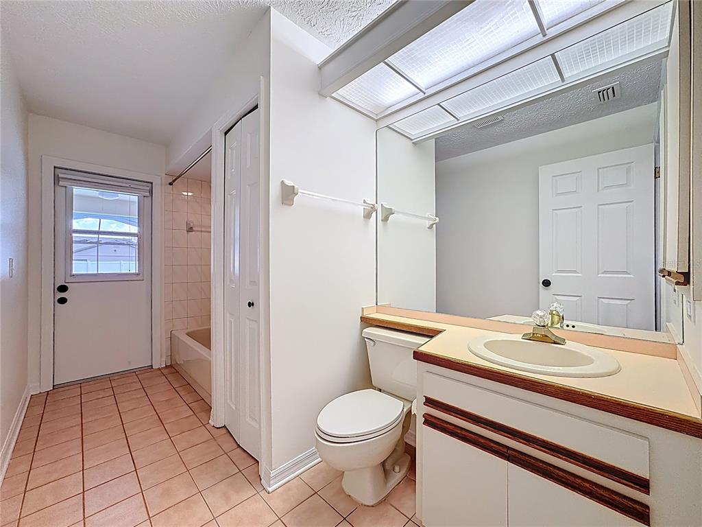 2414 Buckhorn Run Drive Valrico, FL 33596 - Photo 32 of 50 a bathroom with a sink a toilet and shower