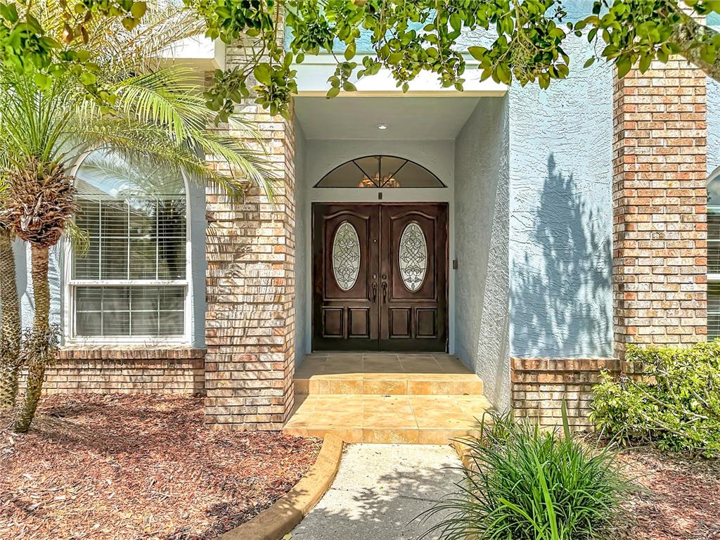 2414 Buckhorn Run Drive Valrico, FL 33596 - Photo 4 of 50 a front view of a house with a yard
