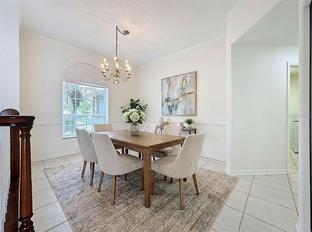 2414 Buckhorn Run Drive Valrico, FL 33596 - Photo 6 of 50 a view of a dining room with furniture and window