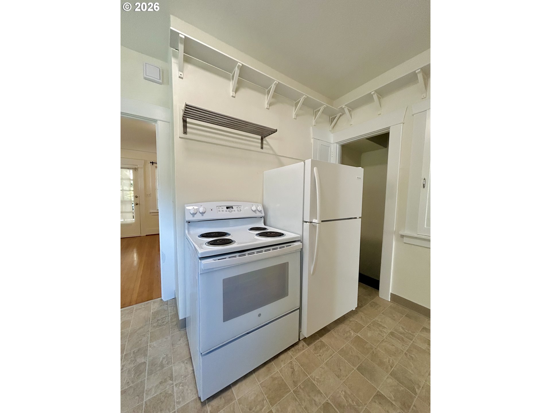 2202 Northeast Everett Street Portland, OR 97232 - Photo 15 of 25 a kitchen with a stove and a refrigerator
