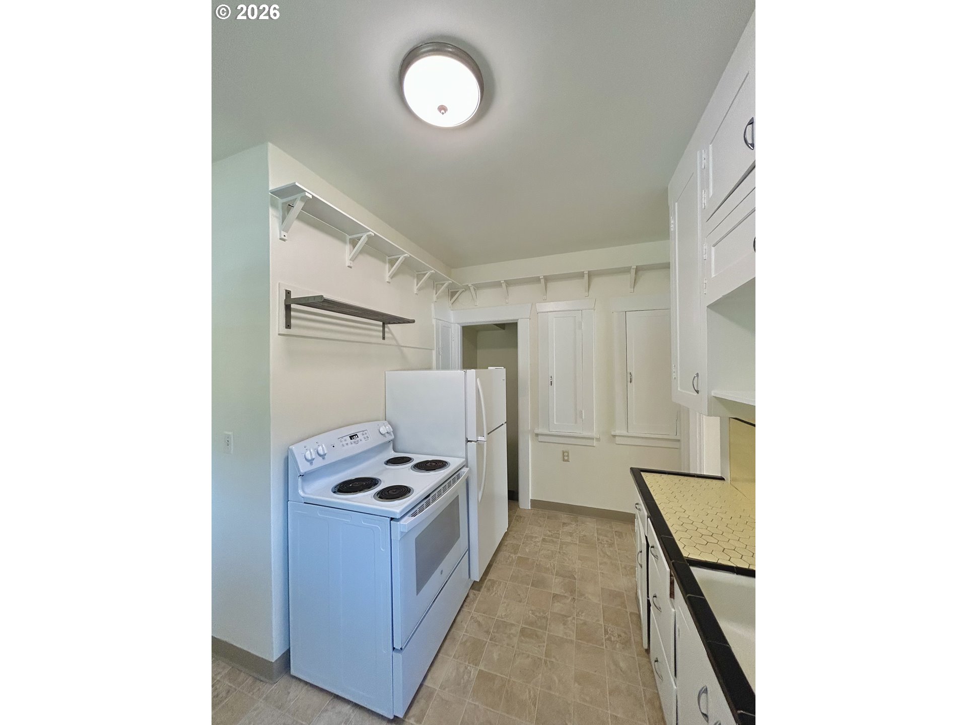 2202 Northeast Everett Street Portland, OR 97232 - Photo 16 of 25 a room with storage and utility