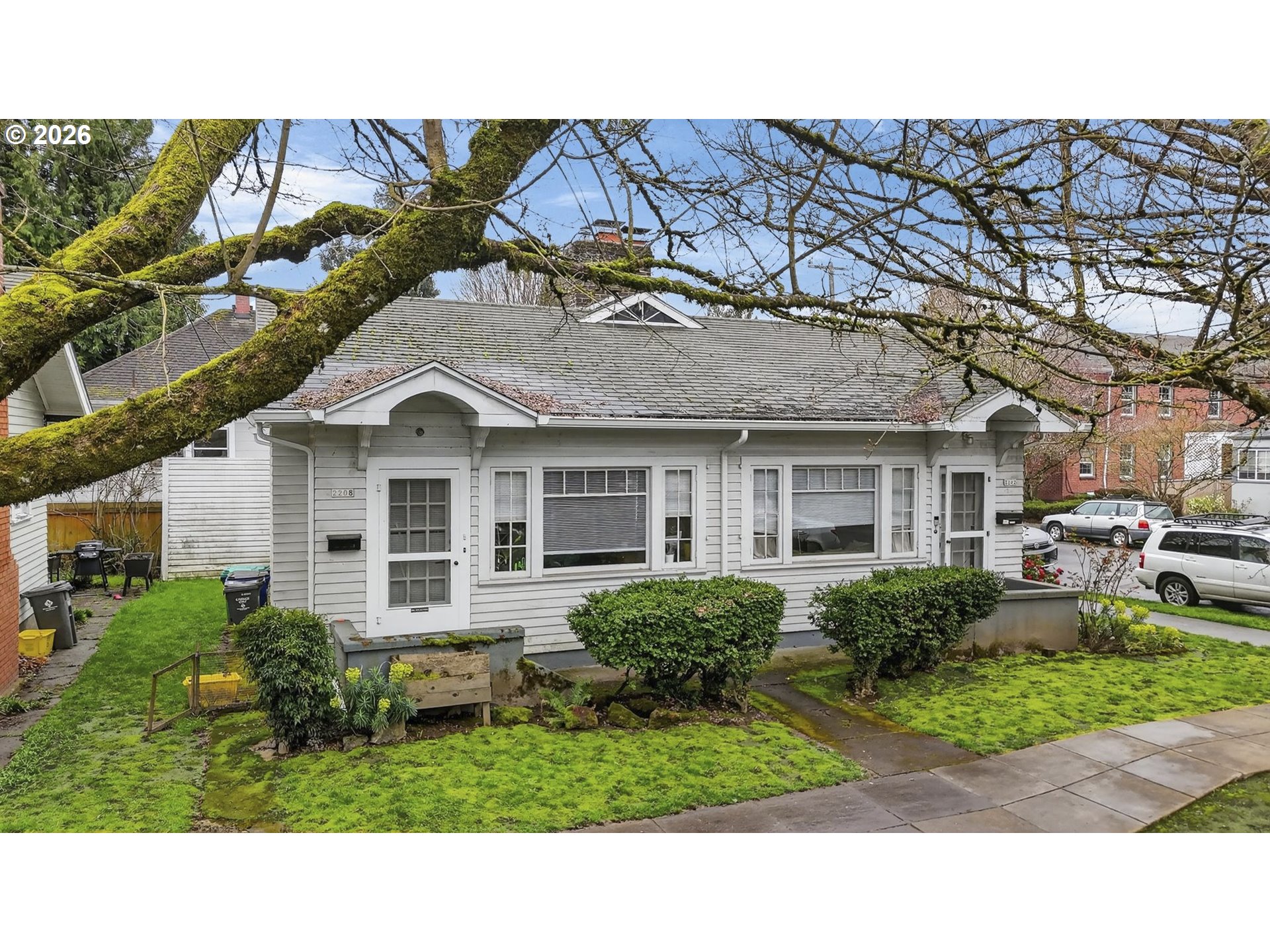 2202 Northeast Everett Street Portland, OR 97232 - Photo 2 of 25 a view of a house with a backyard
