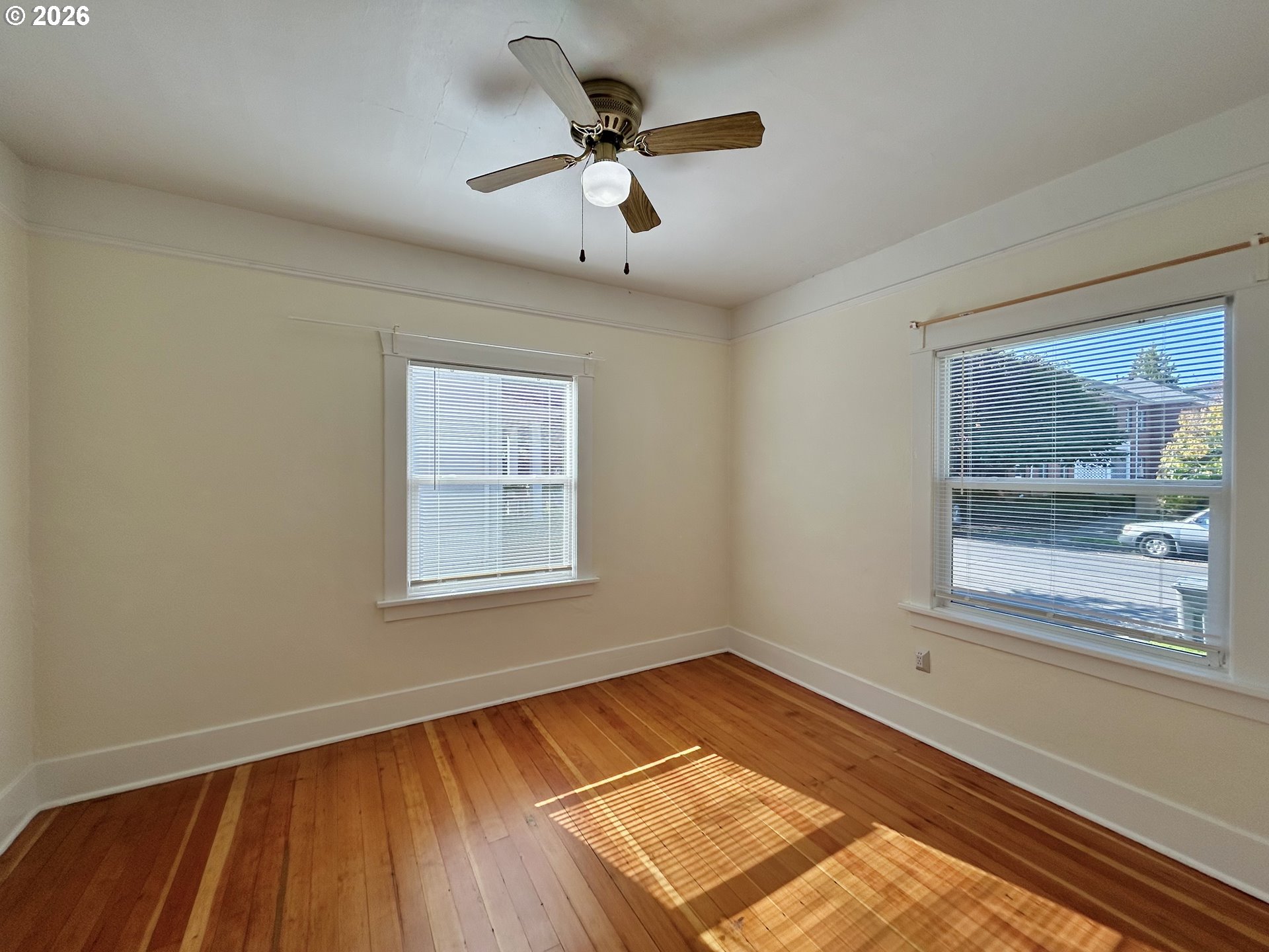 2202 Northeast Everett Street Portland, OR 97232 - Photo 24 of 25 a view of a room with wooden floor and windows
