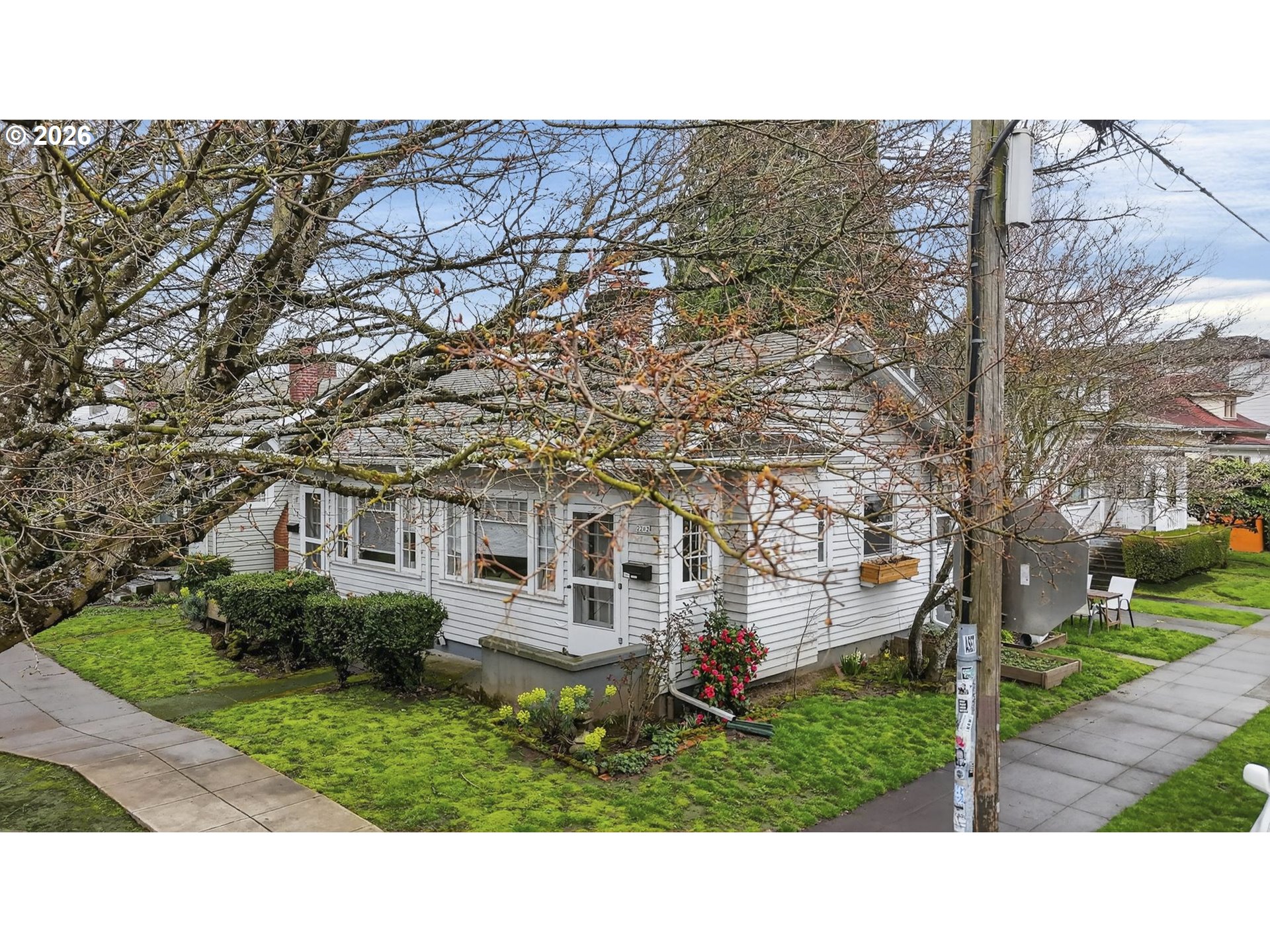 2202 Northeast Everett Street Portland, OR 97232 - Photo 3 of 25 a black and white photo of a house