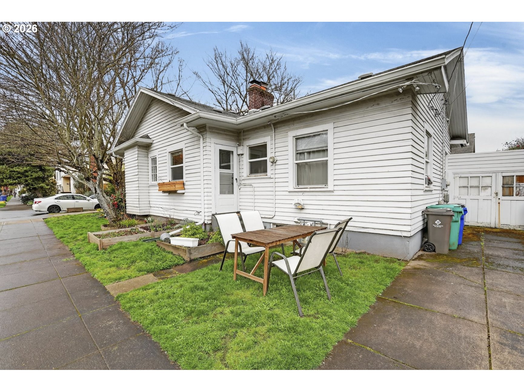 2202 Northeast Everett Street Portland, OR 97232 - Photo 6 of 25 a view of a house with backyard and sitting area