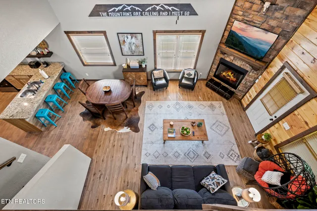 a kitchen with stainless steel appliances granite countertop a stove and a refrigerator