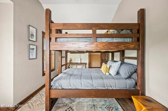 a view of balcony with furniture and wooden deck