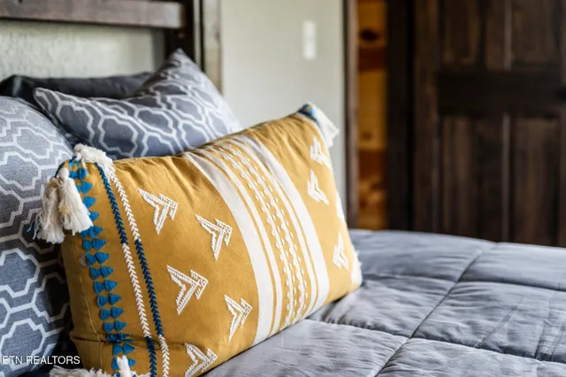 a view of balcony with furniture and wooden deck