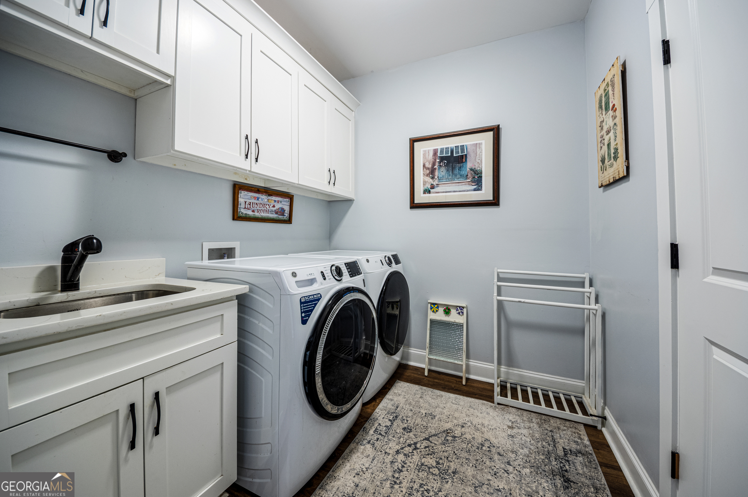 2736 Jones Holly Road Good Hope, GA 30641 - Photo 19 of 49 a utility room with sink dryer and washer