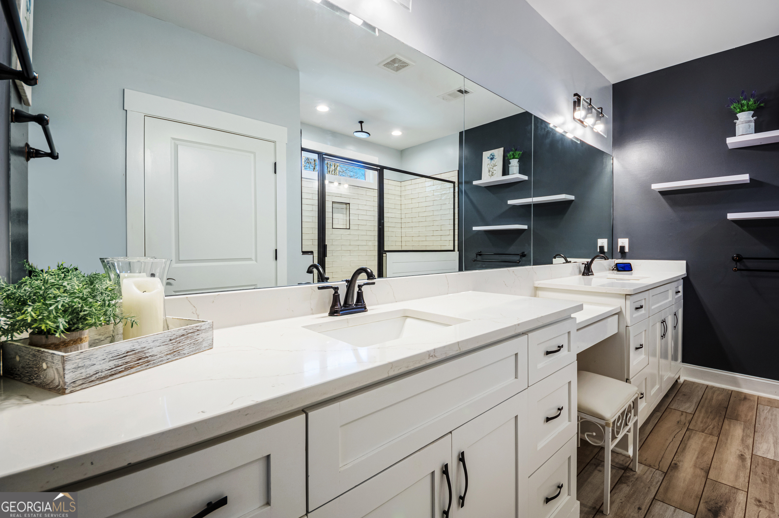 2736 Jones Holly Road Good Hope, GA 30641 - Photo 28 of 49 a bathroom with a sink double vanity and a mirror