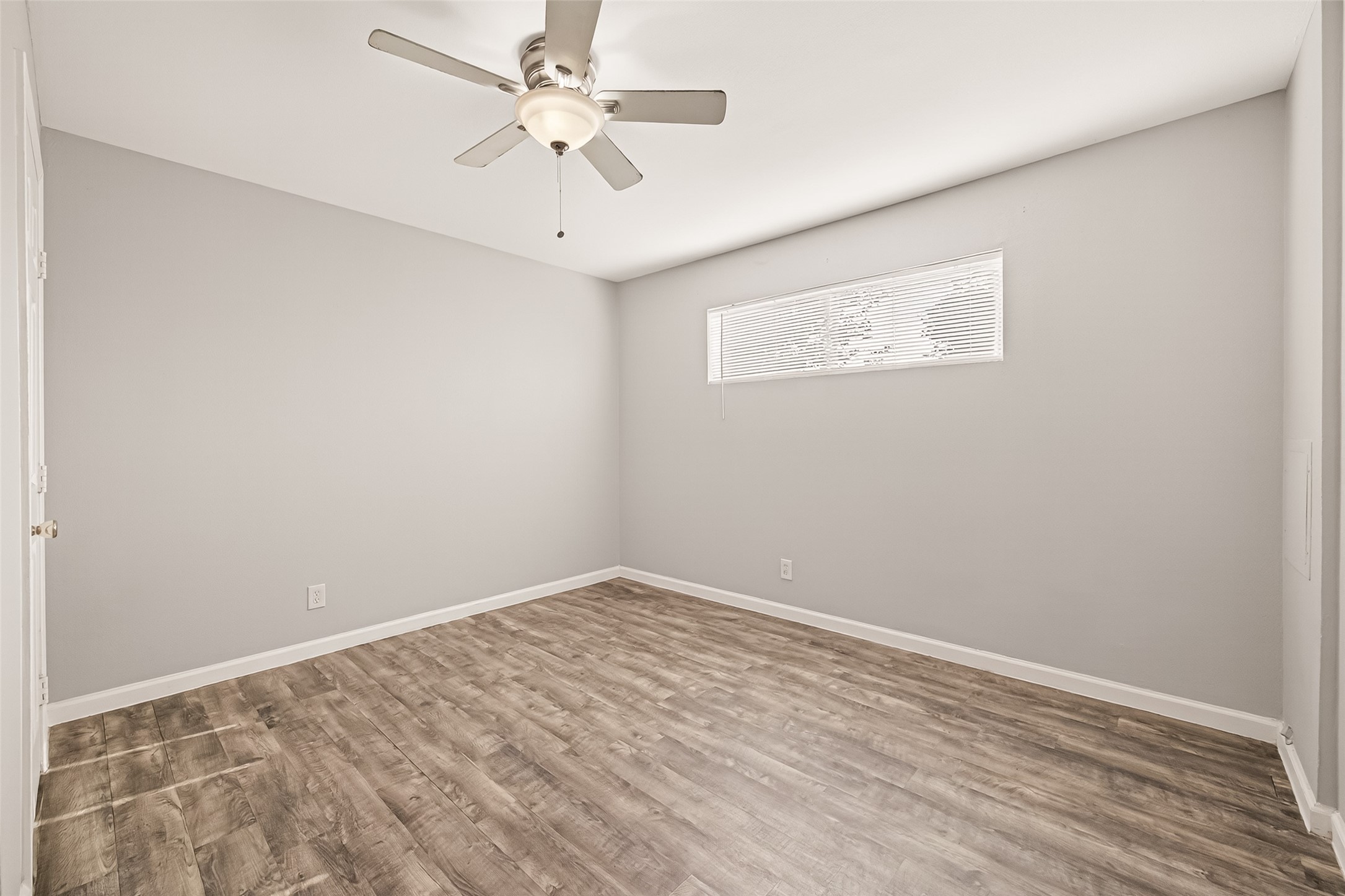 1529 Wirt Road, Unit 1 Houston, TX 77055 - Photo 7 of 16 an empty room with a fan & a window