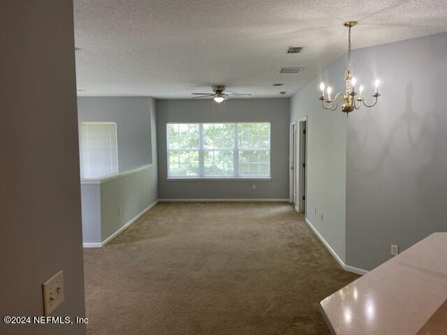 12301 Kernan Forest Boulevard, Unit 302 Jacksonville, FL 32225 - Photo 11 of 14 a view of an empty room with a window