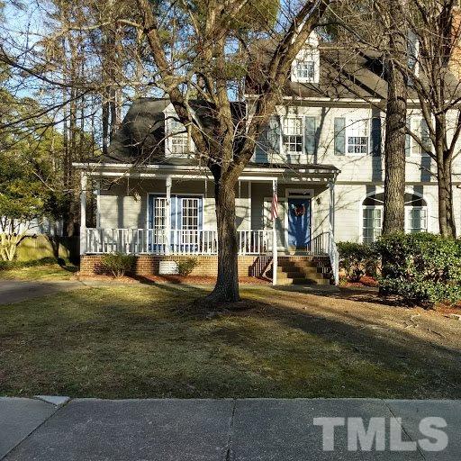 4404 Liverpool Lane Raleigh, NC 27604 - Photo 1 of 18 a front view of a building with a garden