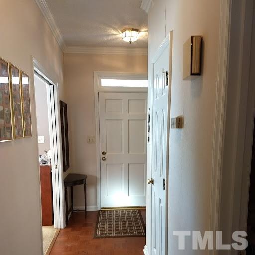 4404 Liverpool Lane Raleigh, NC 27604 - Photo 2 of 18 a view of a closet area with living room
