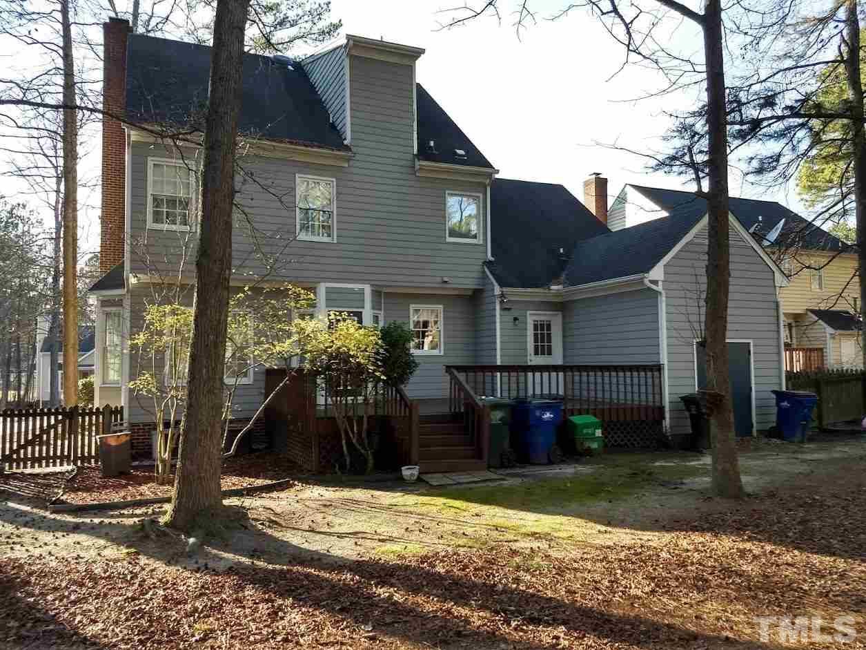 4404 Liverpool Lane Raleigh, NC 27604 - Photo 12 of 18 a view of a house with a yard