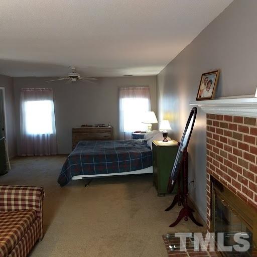 4404 Liverpool Lane Raleigh, NC 27604 - Photo 13 of 18 a bedroom with bed and a window