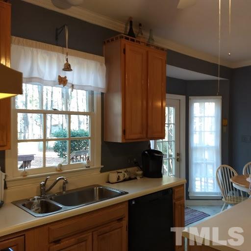 4404 Liverpool Lane Raleigh, NC 27604 - Photo 7 of 18 a kitchen that has a sink and a window