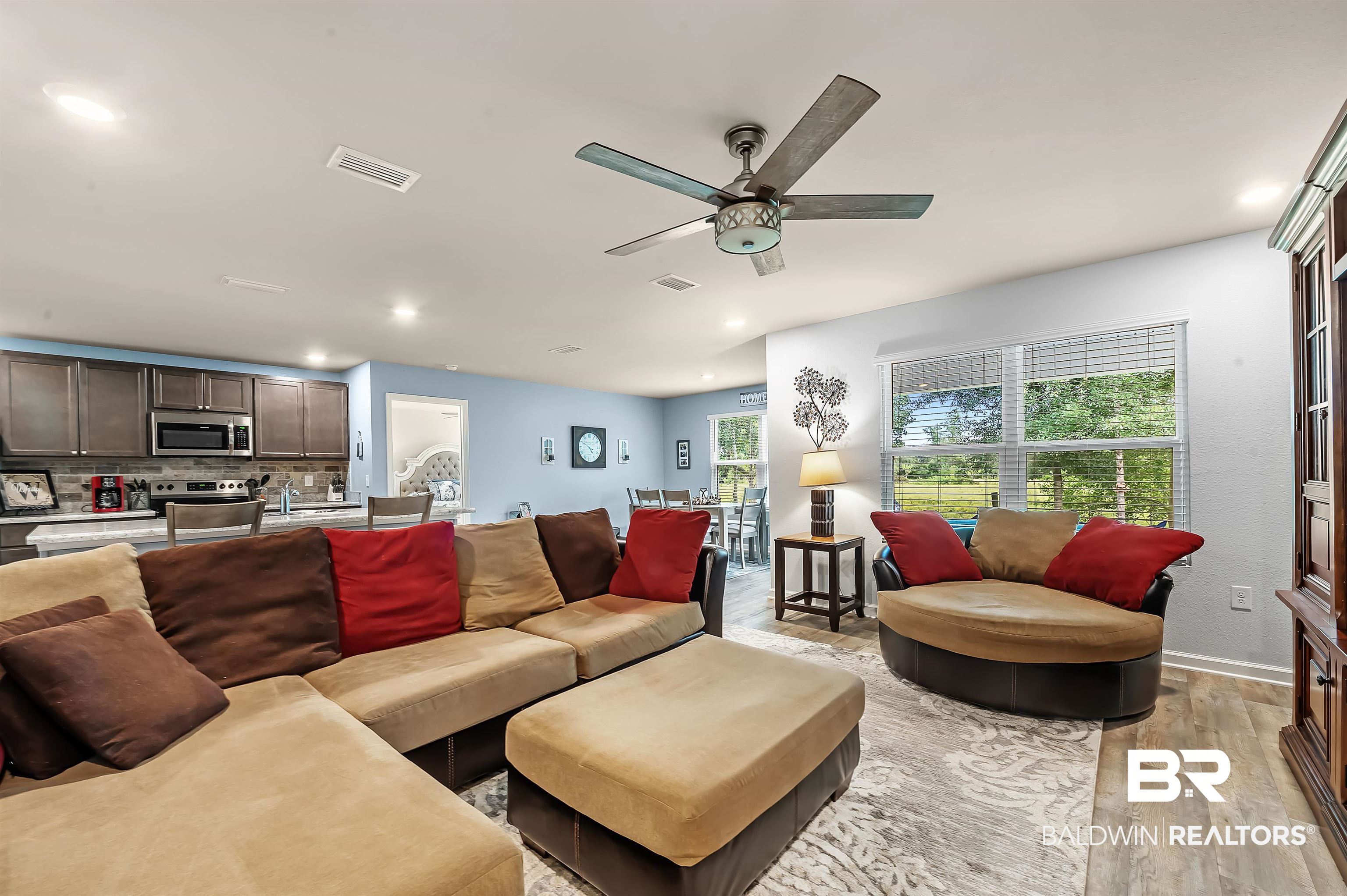 17985 Lewis Smith Drive Foley, AL 36535 - Photo 11 of 56 Living room featuring ceiling fan and light hardwood / wood-style floors
