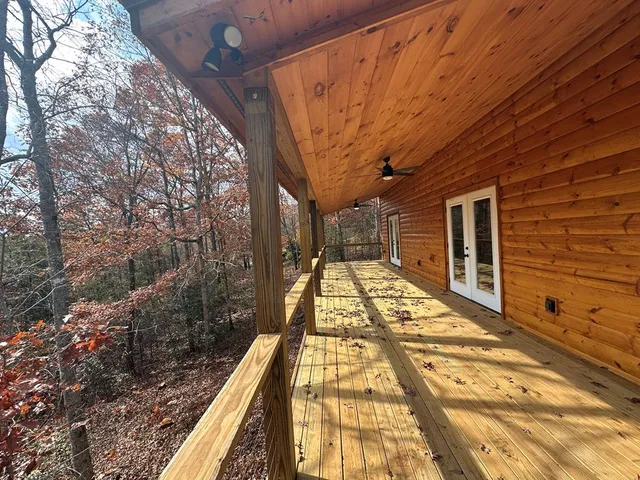 a view of a balcony with staircase