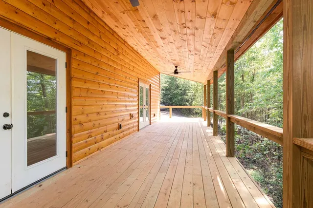 a view of a backyard with pathway