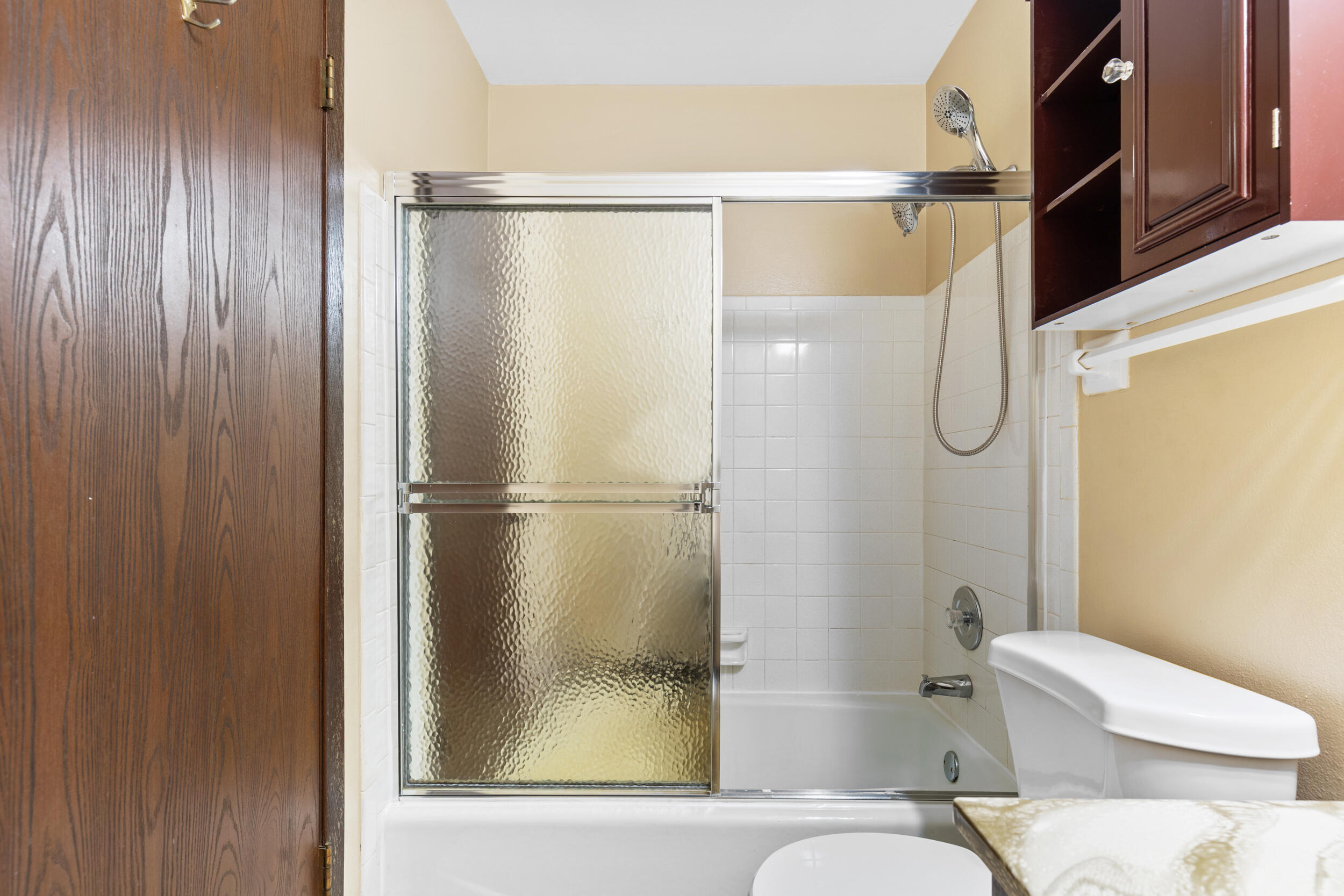 6980 North Raintree Court, Unit D Milwaukee, WI 53223 - Photo 11 of 16 Bathroom