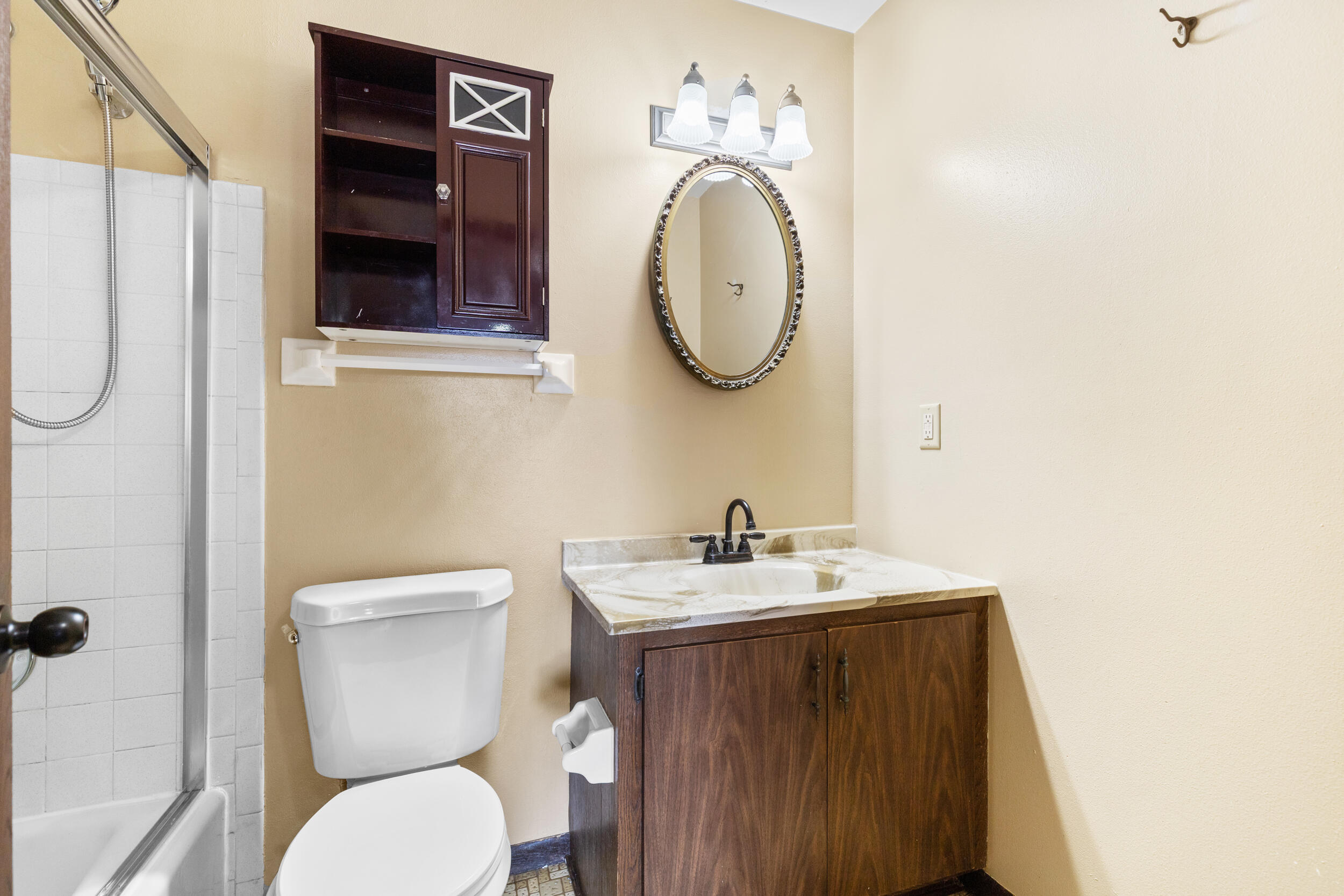 6980 North Raintree Court, Unit D Milwaukee, WI 53223 - Photo 12 of 16 Bathroom