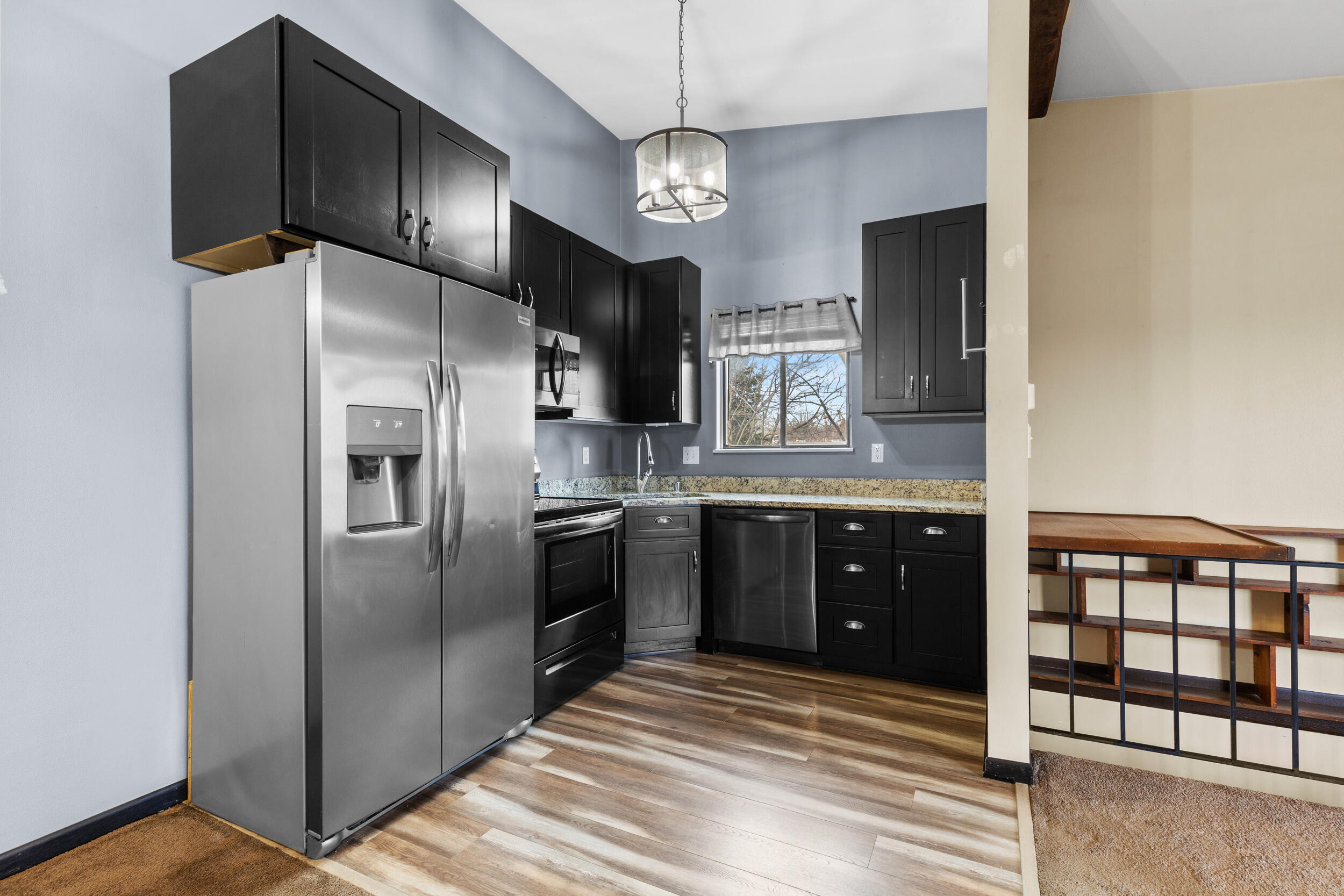 6980 North Raintree Court, Unit D Milwaukee, WI 53223 - Photo 5 of 16 Updated kitchen- appliances included