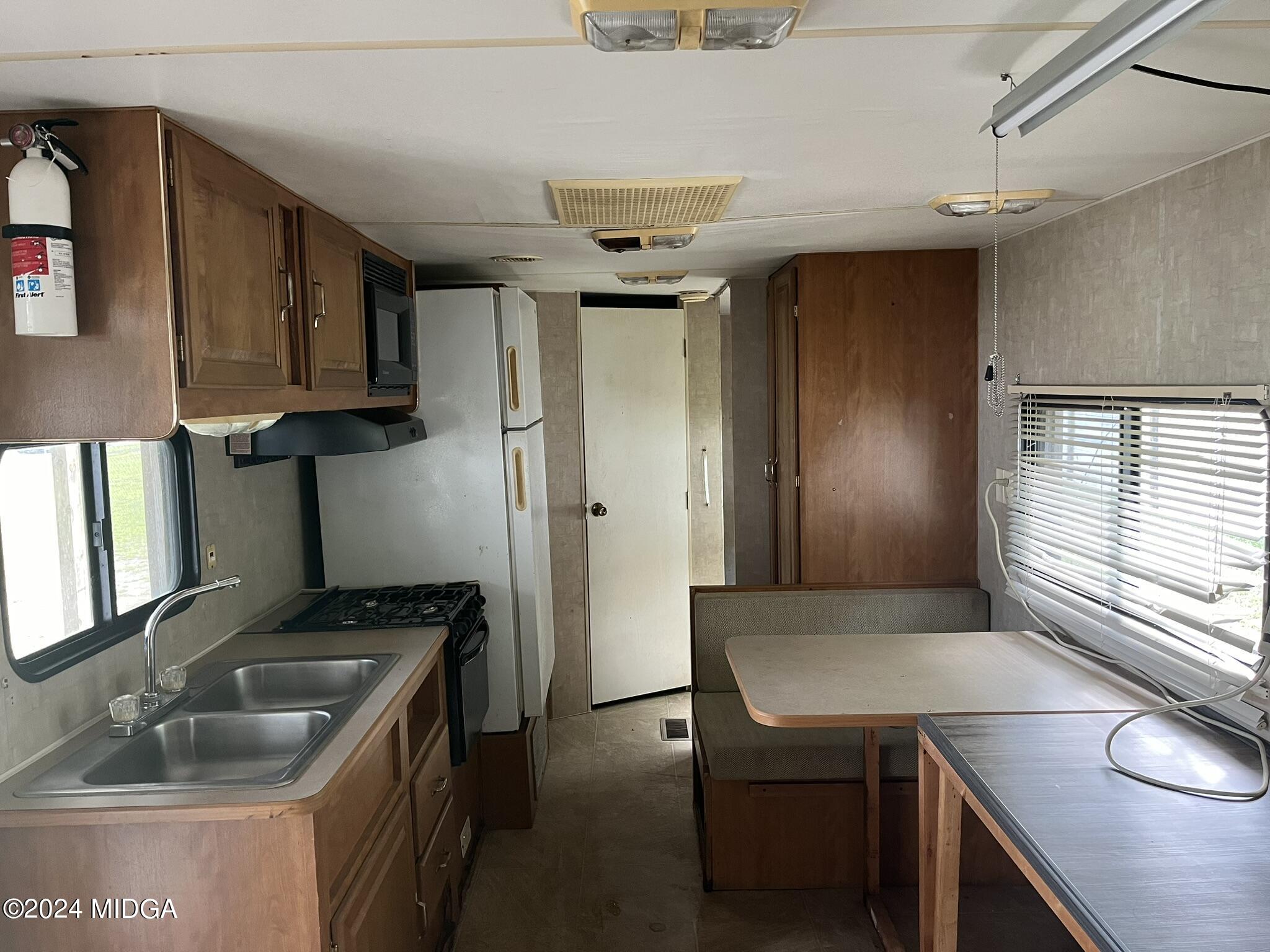 381 Elam Street Gordon, GA 31031 - Photo 20 of 28 break-kitchen area of office