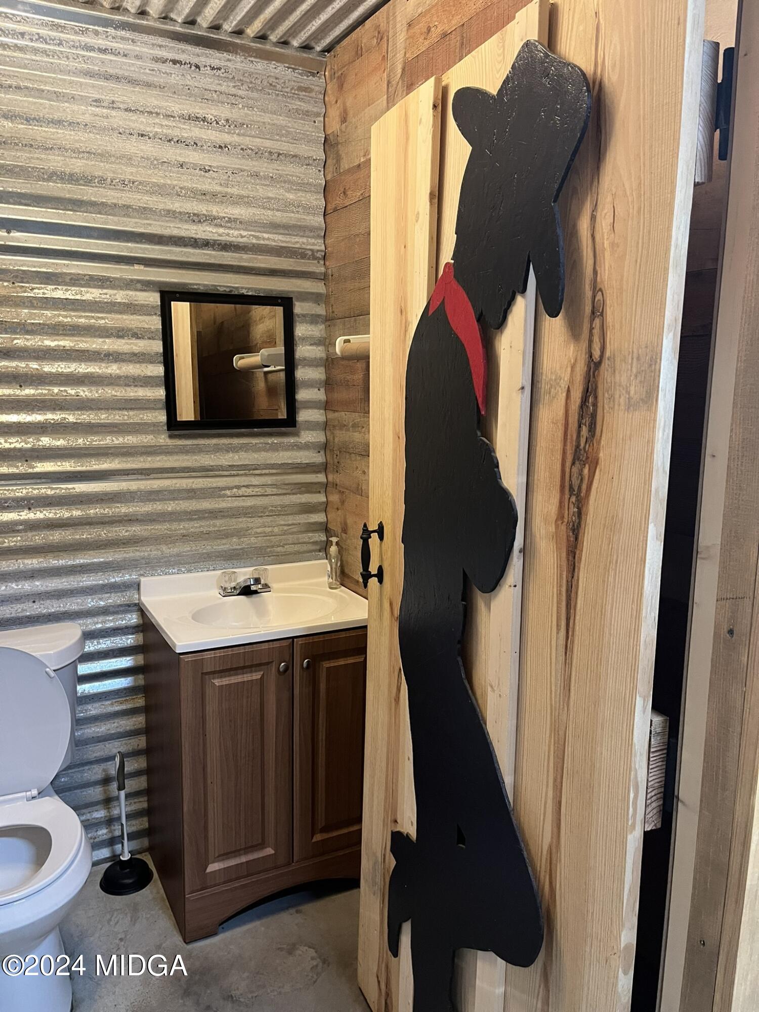 381 Elam Street Gordon, GA 31031 - Photo 10 of 28 men restroom