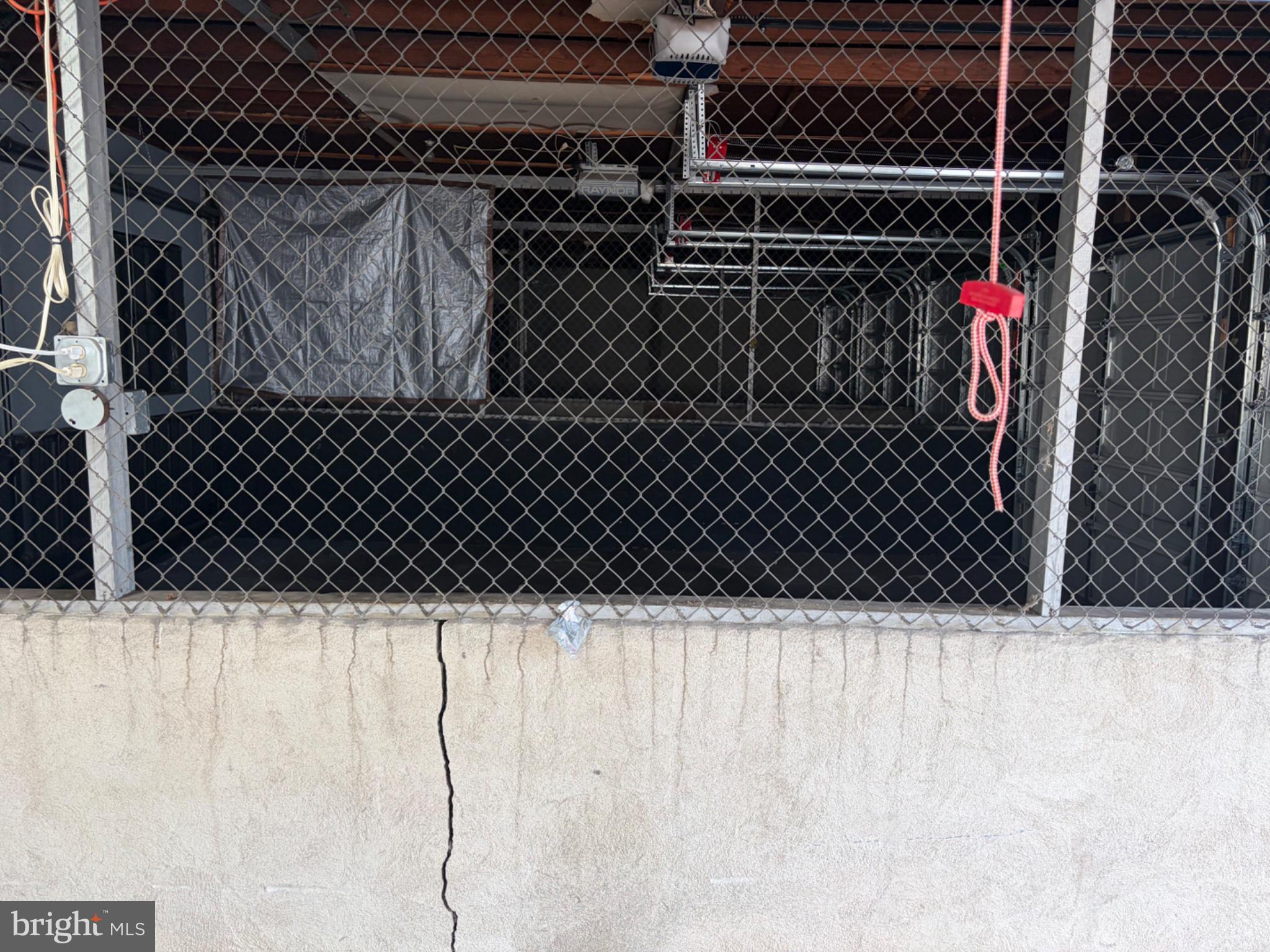 116 North Laurel Street, Unit N Hazleton, PA 18201 - Photo 6 of 6 Urban space with chain-link fencing.