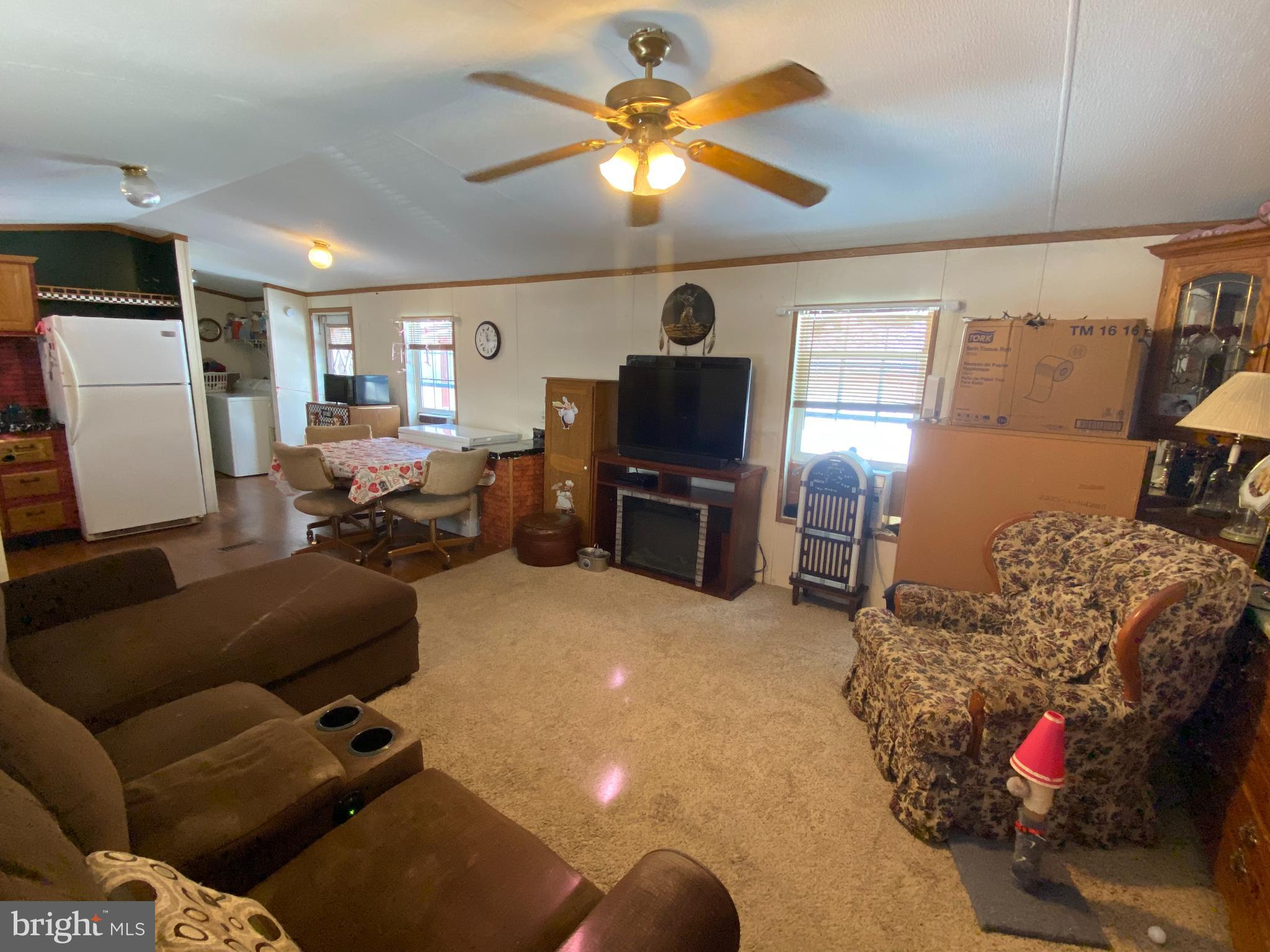 57 Ridgedale Avenue New Providence, PA 17560 - Photo 2 of 9 a living room with furniture and a flat screen tv