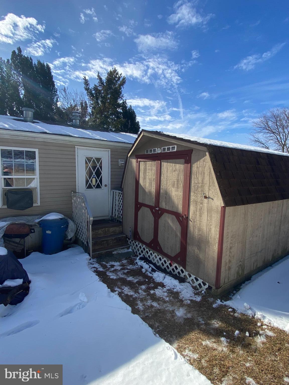 57 Ridgedale Avenue New Providence, PA 17560 - Photo 9 of 9 a view of backyard with barbeque grill and wooden fence