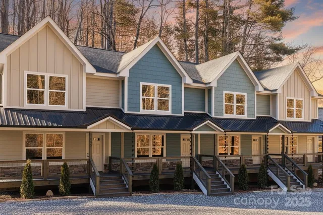 a front view of a house with yard
